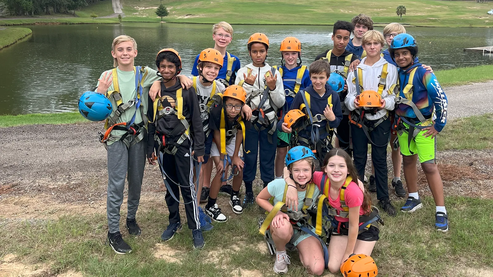Kids Birthday Group At Butter And Egg Adventures In Troy, Al, Wearing Harnesses Near The Lake