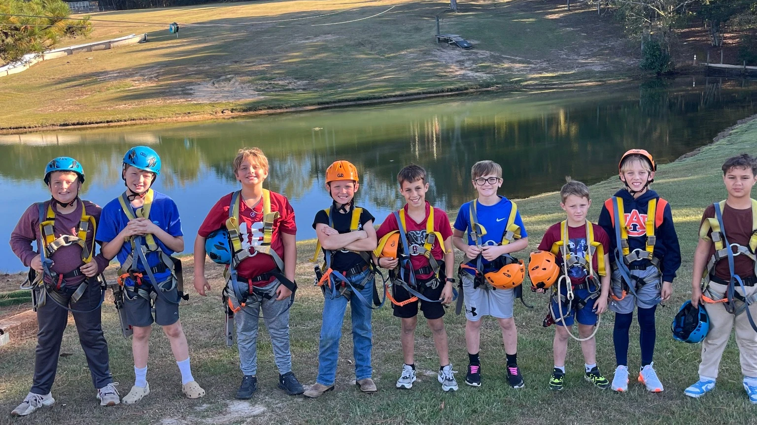 Group Of Kids Geared Up For A Zip Line Tour At Butter And Egg Adventures In Alabama